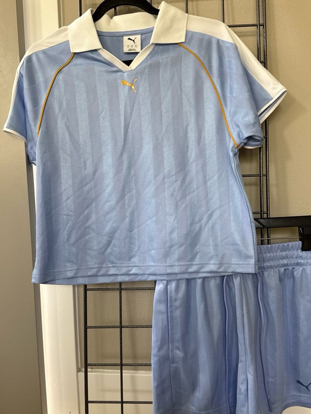 Puma Light Blue and White Soccer-inspired short Set with Gold Accents